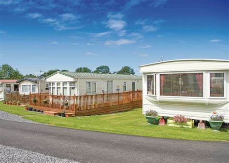 the village holiday park|cross inn caravan park.